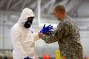 U.S. Army soldiers from the 101st Airborne Division, who are earmarked for the fight against Ebola, train before their deployment to West Africa, at Fort Campbell