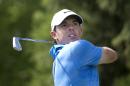 Rory McIlroy, of Northern Ireland, hits from the tee on the second hole during the third round of play in the Tour Championship golf tournament Saturday, Sept. 13, 2014, in Atlanta. (AP Photo/John Bazemore)