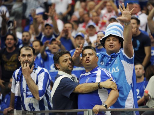 Greek fans get angry during their Group A Euro 2012 soccer match against Poland in Warsaw
