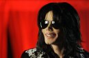 FILE - In this March 5, 2009 file photo, Michael Jackson speaks at a news conference in London. AEG Live LLC CEO Randy Phillips told a jury Wednesday June 12, 2013 that they have heard an inaccurate portrait of Jackson during an ongoing civil trial, and said the entertainer was a sophisticated businessman and not a 