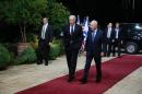Israeli President Shimon Peres welcomes US Vice President Joe Biden in Jerusalem for a meeting on January 13, 2014