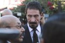 John Mcafee, U.S. anti-virus software guru, addresses a news conference outside the Supreme Court of Justice in Guatemala City