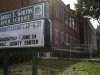 This Thursday, July 5, 2012 photo shows the exterior of the 88 year-old Charles E. Gorton High School in Yonkers, N.Y.  The Yonkers school district is looking for investors to pay for a $1.7 billion overhaul of dozens of schools, including Gorton, built in 1924 and 43% over-enrolled, according to school district officials.  To replace the building would cost $128 million and to overhaul it with repairs would cost $428 million, according to John Carr, who heads up the Yonkers Public Schools Facilities division. Across the country, innovative deals are now being discussed that would put essential pieces of public infrastructure in the hands of global investment firms, the latest effort to cope with a lingering fiscal crisis that has left some communities unable to pay for their needs. (AP Photo/Kathy Willens)