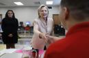 Democratic presidential candidate Hillary Clinton tours classrooms and talks with students at John Marshall High School in Cleveland, Wednesday, Aug. 17, 2016, before participating in a campaign event. (AP Photo/Carolyn Kaster)