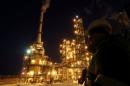 Brent crude futures ease as hope for output freeze fades