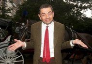 Comedian Rowan Atkinson in character as "Mr. Bean" poses with horse and buggy at in New York to promote a new film in 2007. Mr Bean fans in Indonesia have been warned to beware of a locally made spoof horror film called "Mr. Bean Possessed by D.P." that stars an unknown actor with a resemblance to the popular character