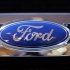 A Ford logo is seen on a car during a press preview at the 2013 New York International Auto Show in New York