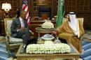 U.S. President Barack Obama meets with Saudi King Salman at Erga Palace upon his arrival for a summit meeting in Riyadh