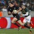 Kahui of New Zealand's All Blacks is chased by Habana of South Africa's Springboks during their Tri-Nations rugby union match in Port Elizabeth