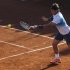 Nadal of Spain returns a shot during men's doubles tennis match at the Chilean Open tennis tournament in Vina del Mar city
