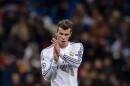 Gareth Bale applauds at the end of Real Madrid's Champions League game against Galatasaray at the Santiago Bernabeu stadium in Madrid on November 27, 2013