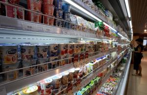 A customer shops for dairy products at a supermarket &hellip;