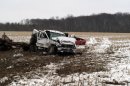 This photo provided by Indiana State Police shows the scene of a crash between two pick trucks that killed three teenagers Thursday, March 7, 2013 near Versailles, Ind. Sgt. Noel Houze said during a news conference Thursday that the six students involved in the crash attended South Ripley County High School in Versailles, a small community about 45 miles west of Cincinnati. (AP Photo/Indiana State Police)