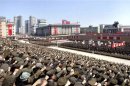 North Koreans attend a rally in support of North Korean leader Kim Jong-un's order to put its missile units on standby in preparation for a possible war against the U.S. and South Korea, in Pyongyang