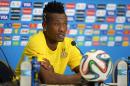 Ghana's forward and Captain, Asamoah Gyan speaks to the media during a press conference before training in the Das Dunas stadium in Natal on June 15, 2014 during the 2014 FIFA World Cup