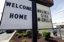 FILE - In this Thursday, May 9, 2013 file photo, a "Welcome Home" sign is posted at a restaurant near a crime scene where three women were held captive for a decade in Cleveland. For Gina DeJesus, Amanda Berry and Michelle Knight, who were freed from captivity inside a Cleveland house Monday, May 6, 2013, the ordeal is not over. Next comes recovery _ from sexual abuse and their sudden, jarring reentry into a world much different than the one they were snatched from a decade ago. (AP Photo/David Duprey, File)