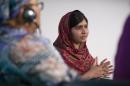 Pakistani schoolgirl activist Malala Yousafzai speaks at the 'Girl Summit 2014' at the Walworth Academy in London