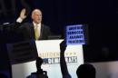 Members of environmental organizations demonstrate against hydraulic fracturing oil extraction, or fracking, as California Governor Brown speaks at 2014 California Democrats State Convention at the Los Angeles Convention Center