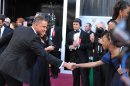 Actors Channing Tatum, left, and Quvenzhane Wallis greet each other as they arrive at the 85th Academy Awards at the Dolby Theatre on Sunday Feb. 24, 2013, in Los Angeles. (Photo by John Shearer/Invision/AP)
