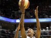 Indiana Fever forward Tamika Catchings (24) fights for a rebound with Minnesota Lynx forward Taj McWilliams-Franklin (8) in the first half of Game 3 of the WNBA basketball Finals, Friday, Oct. 19, 2012, in Indianapolis. (AP Photo/AJ Mast)