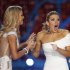 Miss New York, Mallory Hagan, right, reacts with Miss South Carolina Ali Rogers as she is crowned Miss America 2013 on Saturday, Jan. 12, 2013, in Las Vegas. (AP Photo/Isaac Brekken)