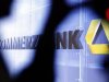 A media representative operates a TV camera during Germany's Commerzbank annual shareholder's meeting in Frankfurt