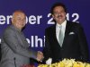Indian Home Minister Shinde shakes hands with Pakistan's Interior Minister Malik before their bilateral meeting in New Delhi