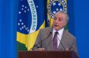 Brazilian President Michel Temer speaks during the launching ceremony of the "Reform Card" -a credit card for low-income families-, as part of a program to improve the housing conditions in irregular settlements, at Planalto Palace in Brasilia