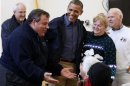 U.S. President Barack Obama and New Jersey Governor Christie talk to survivors of Hurricane Sandy while in New Jersey