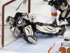 Pittsburgh Penguins goalie Vokoun watches a puck shot by Philadelphia Flyers Voracek go into the net during their NHL game in Pittsburgh