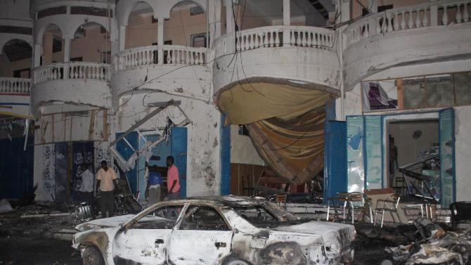 The site of a car bomb attack in the Somali capital Mogadishu, late on October 12, 2014