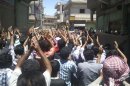 Demonstrators protest against Syria's President Bashar al-Assad at Al Sukri in Aleppo