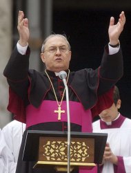** FILE ** Archbishop Leonardo Sandri of Argentina recites the Sunday Angelus prayer, serving as a stand-in for Pope John Paul II, in St. Peter's Square at the Vatican, in this Sunday, March 6, 2005 file photo. Sandri is one of the 23 new cardinals the pontiff will elevate in a solemn ceremony next Nov. 24. The pope named Wednesday, Oct. 17, 2007, 23 new cardinals, including the Chaldean patriarch of Baghdad, two Americans and archbishops from four continents to join the elite ranks of the "princes" of the Roman Catholic Church.  Eighteen of the 23 are under age 80 and thus eligible to vote in a conclave to elect a future pontiff. (AP Photo/Gregorio Borgia, File)