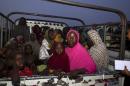 Women and children rescued from Islamist militant group Boko Haram in the Sambisa forest by the Nigerian military arrive at an internally displaced people's camp in Yola