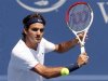 Federer of Switzerland hits a return to Djokovic of Serbia in their championship match at the men's Cincinnati Open tennis tournament in Cincinnati