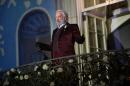 FILE - This image released by Lionsgate shows Donald Sutherland as President Snow in a scene from the film, "The Hunger Games: Catching Fire." Hollywood is expected to have a banner year as box office totals are projected to peak at just under $11 billion, bringing in more multiplex revenue in 2013 than ever before. (AP Photo/Lionsgate, Murray Close, File)