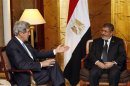 U.S. Secretary of State John Kerry meets with Egyptian President Mohamed Mursi in Addis Ababa
