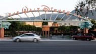 The signage at the main gate of The Walt Disney Co. is pictured in Burbank, California, May 7, 2012. REUTERS/Fred Prouser