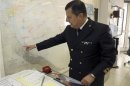 Admiral Ferrara of Italy points at a map which shows the coordinates to search for a U.S. F-16 fighter jet that went missing over the Adriatic sea, in Ravenna