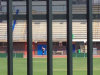 In this photo taken March 24 2013, shows Olympian athlete Oscar Pistorius running on the track at the University of Pretoria South Africa. The photo was taken by a pupil from the Voortrekker High School in Pietermaritzburg while on a hockey tour in Pretoria. A South African newspaper published the grainy cellphone image of Pistorius at a running track in his carbon fiber blades Thursday as the Olympian’s agent said his return to training was now imminent, but denied he was already in training. (AP Photo/Lisa Smith)