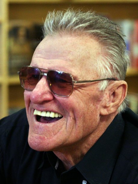 In this March 12, 2011 photo, actor and author Charles Napier is shown at an appearance for his book, "Square Jaw and Big Heart," at Russo's Books in Bakersfield, Calif. Napier, a character actor whose granite jaw and toothy grin earned him tough-guy roles in movies like ``Rambo: First Blood Part 2,'' died Wednesday, Oct. 5, 2011 at Bakersfield Memorial Hospital in California. He was 75.   (AP Photo/The Bakersfield Californian, Casey Christie)  MAGS OUT, TV OUT, NO SALES. MANDATORY CREDIT