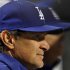 Los Angeles Dodgers manager Don Mattingly looks on against the New York Mets during the fifth inning of their MLB National League baseball game at CitiField in New York