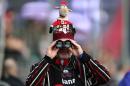 A Saracens fan looks on from the stands ahead of the European Rugby Champions Cup rugby union match in north London on December 19, 2015