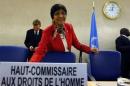 UN High Commissioner for Human Rights Pillay arrives for her address to the 25th session of the Human Rights Council at the United Nations in Geneva