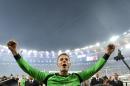 FILE - In this July 13, 2014 file photo Germany's goalkeeper Manuel Neuer celebrates after the World Cup final soccer match between Germany and Argentina at the Maracana Stadium in Rio de Janeiro, Brazil, Sunday, July 13, 2014. Germany won the match 1-0. Forwards Cristiano Ronaldo of Portugal and Lionel Messi of Argentina are finalists for the men's honor along with German goalkeeper Manuel Neuer, FIFA said Monday, Dec. 1, 2014. Ronaldo won in 2008 and 2013, while Messi won four in a row from 2009-12. (AP Photo/Martin Meissner)