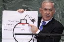 Israel's Prime Minister Netanyahu points to red line he drew on graphic of bomb used to represent Iran's nuclear program, in New York