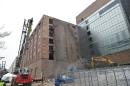 A section of a wall is demolished as work officially begins on the Museum of the Bible on February 12, 2015, in Washington, DC