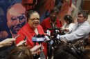 Chicago Teachers Union President Karen Lewis speaks to the news media after casting her ballot during a strike authorization vote at a Chicago high school Wednesday, June 6, 2012. Lewis says union members don't want to disrupt the start of the next school year with a strike, but she says they feel voting to authorize one is needed to negotiate a better contract. (AP Photo/M. Spencer Green)