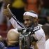Miami Heat's LeBron James celebrates after the Heat defeated the Charlotte Bobcats during a NBA basketball game in Miami, Sunday, March 24, 2013. The Heat won 109-77 for their 26th victory in a row.  (AP Photo/J Pat Carter)