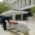 A United State Capitol Police officer secures a vehicle barrier outside of the Hart Senate Office Building in Washington